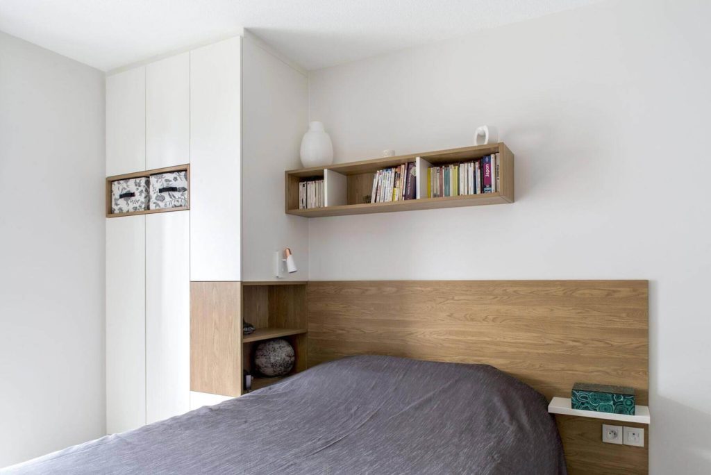 Aménagement intérieur sur mesure dans une chambre à Paris avec placard et tête de lit